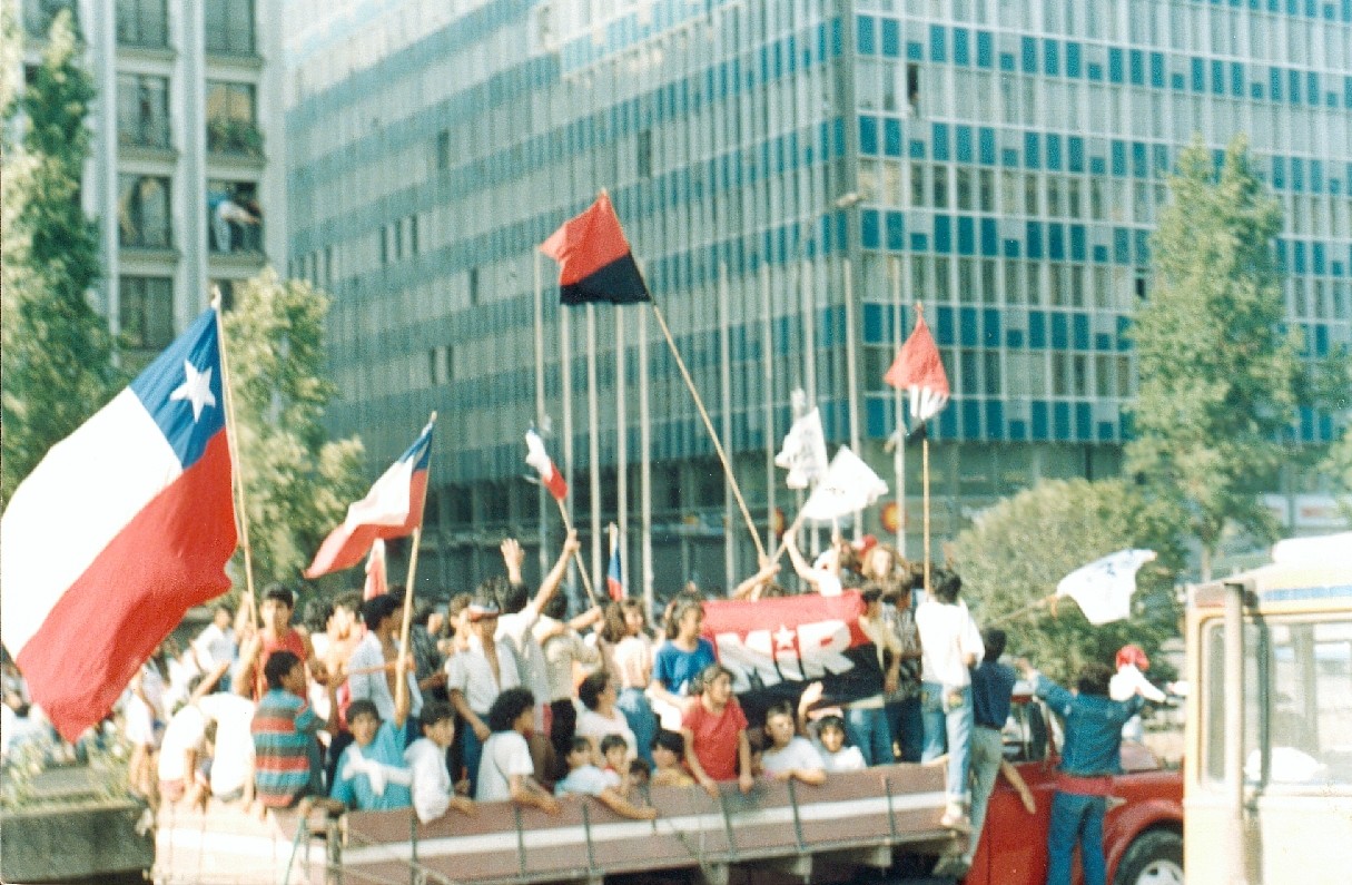 Crowds celebrate the No campaign's victory on the Alameda in central Santiago, October 6, 1988, after voters rejected the eight-year extension of Augusto Pinochet's rule.