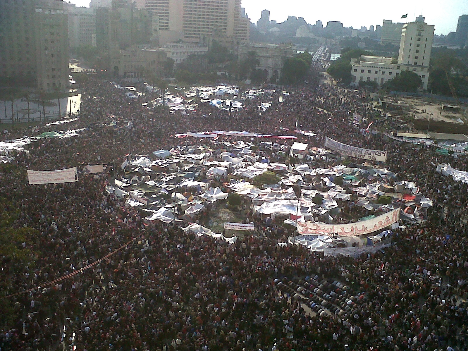 Tahrir Square in central Cairo on 8 February 2011, packed shoulder-to-shoulder with protesters, three days before Mubarak's resignation.